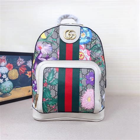 sewing the word gucci on some cheap backpacks|gucci diamond patterns.